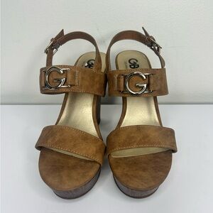 by guess Women's Brown  size 7 see pictures please  has the rubber cover raised